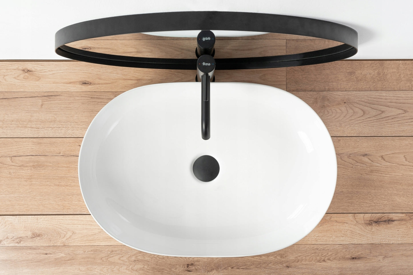 Baltas ovalus 60 cm stalviršio praustuvas REA CLEO, didelis
