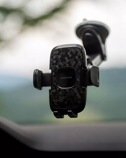 AUTOMOBILINIS TELEFONO LAIKIKLIS SPACECASE GHOST, MONTUOJAMAS ANT PRIETAISŲ SKYDELIO AR STIKLO, REGULIUOJAMAS