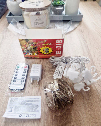 Kalėdinė LED užuolaida 3x3m 300 mikro lempučių USB pultelis kabliukai šilta balta