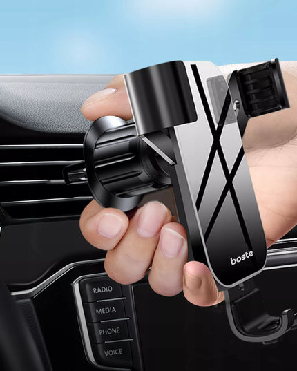 Boste gravitacinis automobilinis telefono laikiklis ventiliacijos grotelėms