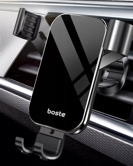 Boste gravitacinis automobilinis telefono laikiklis ventiliacijos grotelėms
