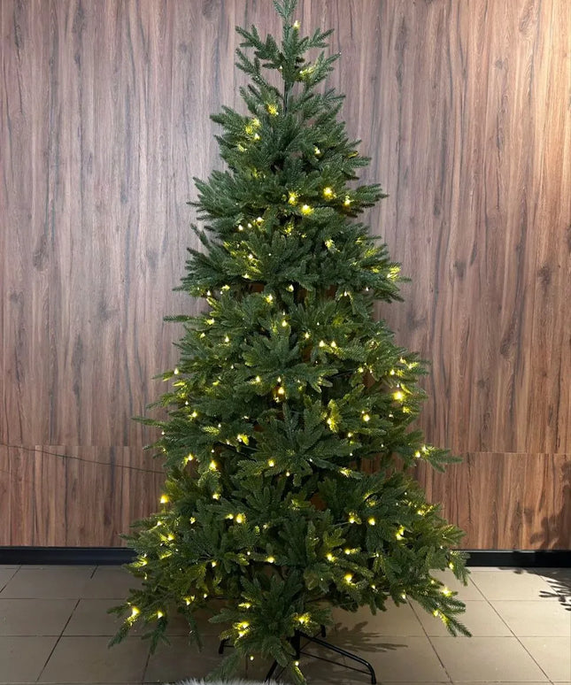 Dirbtinė eglutė Arkties eglė žalia PE+PVC 215 cm + LED girlianda