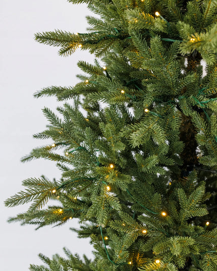 Dirbtinė eglutė Arkties eglė žalia PE+PVC 215 cm + LED girlianda