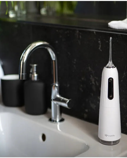 „TrueLife AquaFloss Compact C200“ belaidis burnos irigatorius su antgalių rinkiniu