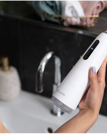 „TrueLife AquaFloss Compact C200“ belaidis burnos irigatorius su antgalių rinkiniu
