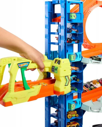 „Hot Wheels City“ rinkinys „Mega garažas: drakono ataka“ + 2 automobiliukai