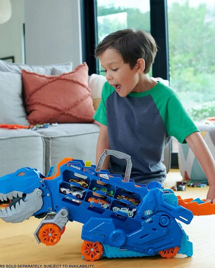 „Hot Wheels“ mega transporteris „T-Rex“ 2 viename su lenktynių trasa ir 2 automobiliukais
