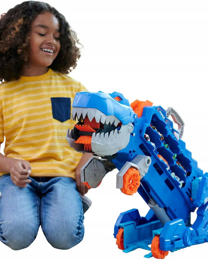 „Hot Wheels“ mega transporteris „T-Rex“ 2 viename su lenktynių trasa ir 2 automobiliukais