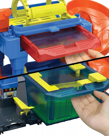 Hot Wheels City „Nuotykių posūkių“ plovykla su tuneliu ir spalvą keičiančiu automobiliuku HNT80