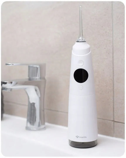 Belaidis burnos irigatorius „TrueLife AquaFloss Compact C300 White“ su keičiamų antgalių rinkiniu