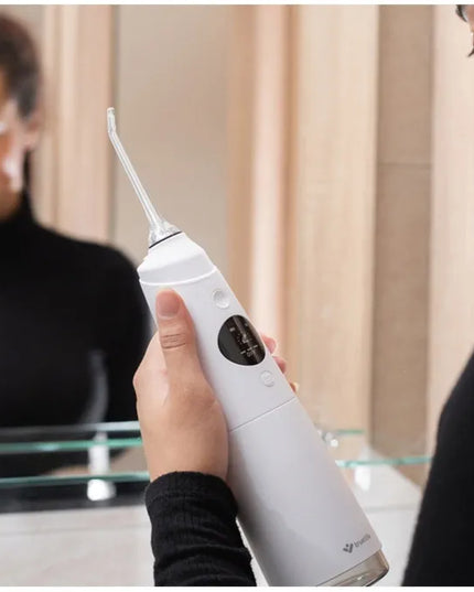 Belaidis burnos irigatorius „TrueLife AquaFloss Compact C300 White“ su keičiamų antgalių rinkiniu