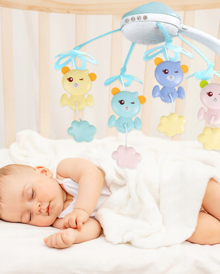 Karuselė lovytei su žvaigždžių projektoriumi, melodijomis ir meškučiais, valdoma pulteliu