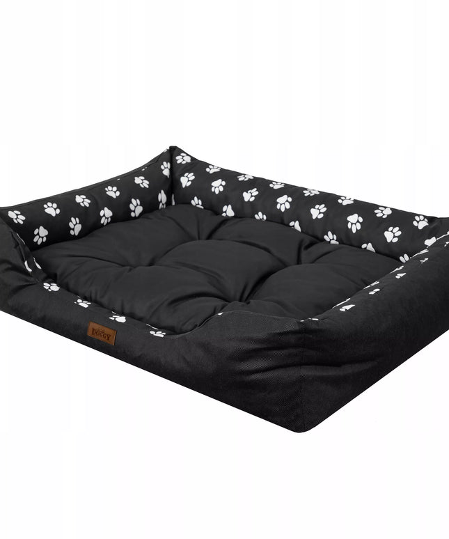 Šuns guolis Doggy Puffy didelis XXL 114x84 cm sofa lova juoda su pėdutėmis
