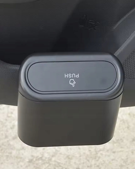 Mažas automobilinis šiukšlių kibiras ant sėdynės šono