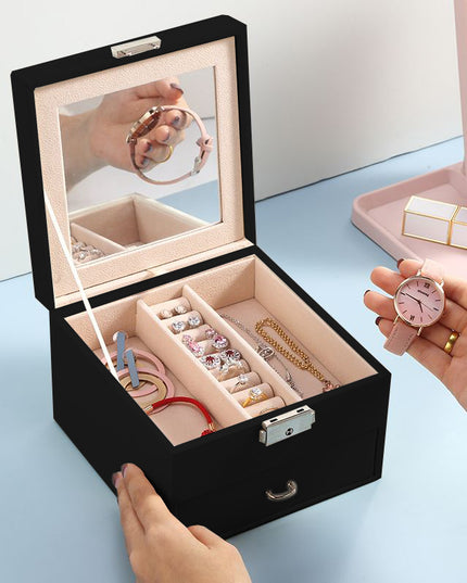 Talpi, elegantiška papuošalų dėžutė – skrynelė su veidrodėliu ir organizatoriumi.