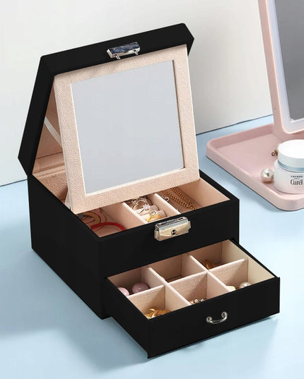 Talpi, elegantiška papuošalų dėžutė – skrynelė su veidrodėliu ir organizatoriumi.