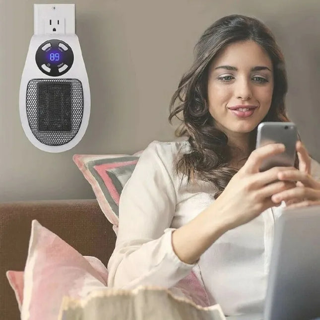 Nešiojamas elektrinis mini šildytuvas su ventiliatoriumi į elektros lizdą