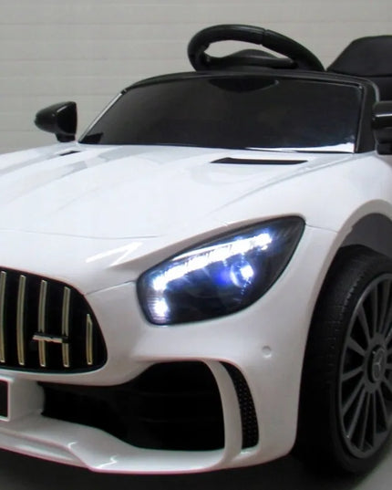Baltas vaikiškas elektromobilis Mercedes GTR-S, minkšti EVA ratai, odinė sėdynė