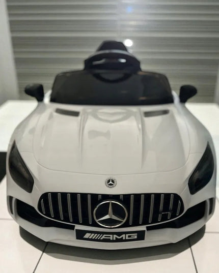 Baltas vaikiškas elektromobilis Mercedes GTR-S, minkšti EVA ratai, odinė sėdynė
