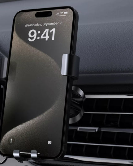 Boste gravitacinis automobilinis telefono laikiklis ventiliacijos grotelėms