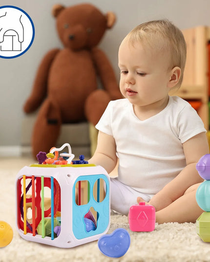 MONTESSORI kaladėlių rūšiuoklė su guminėmis juostelėmis 7 viename daugiafunkcis lavinamasis sensorinis kubas