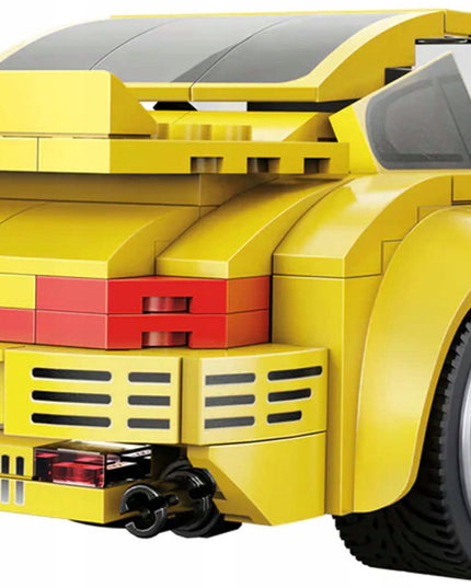 Nuotoliniu būdu valdomas lego sportinis automobilis konstruktorius Yellowbird (CaDA, 222 elementai)